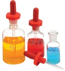 Pipette Dropping Clear Glass Bottles